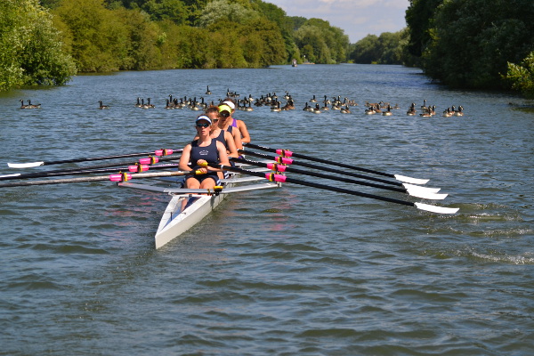 Oxford University Women's Lightweight Rowing Club in a boat on the Thames